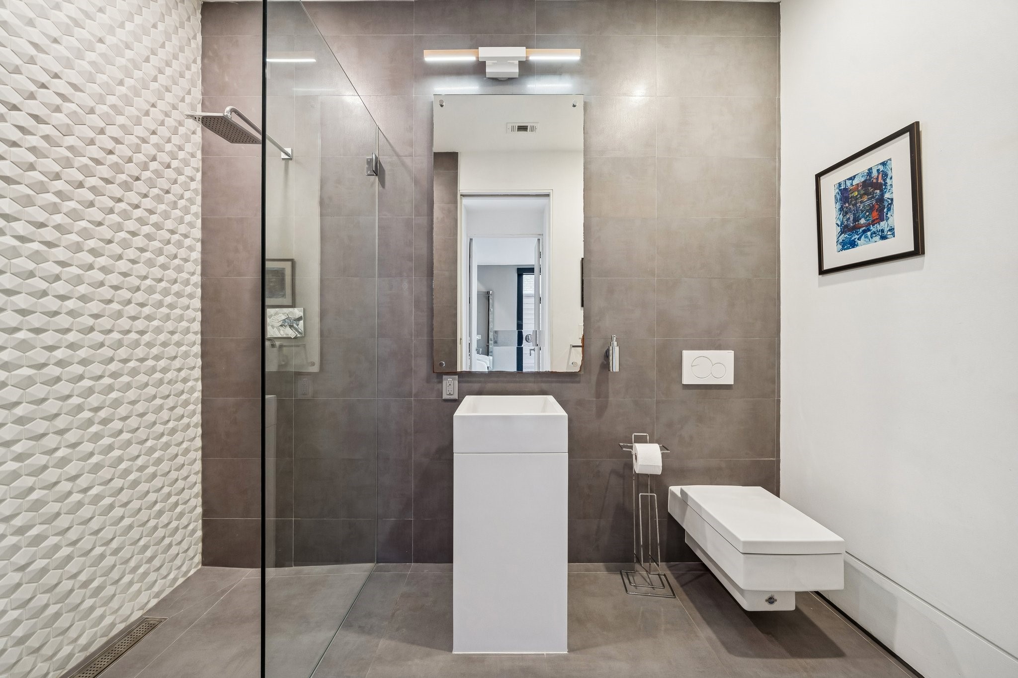 2332 Wroxton Road Houston, TX 77005 - Photo 23 of 50 a bathroom with a toilet tub and shower