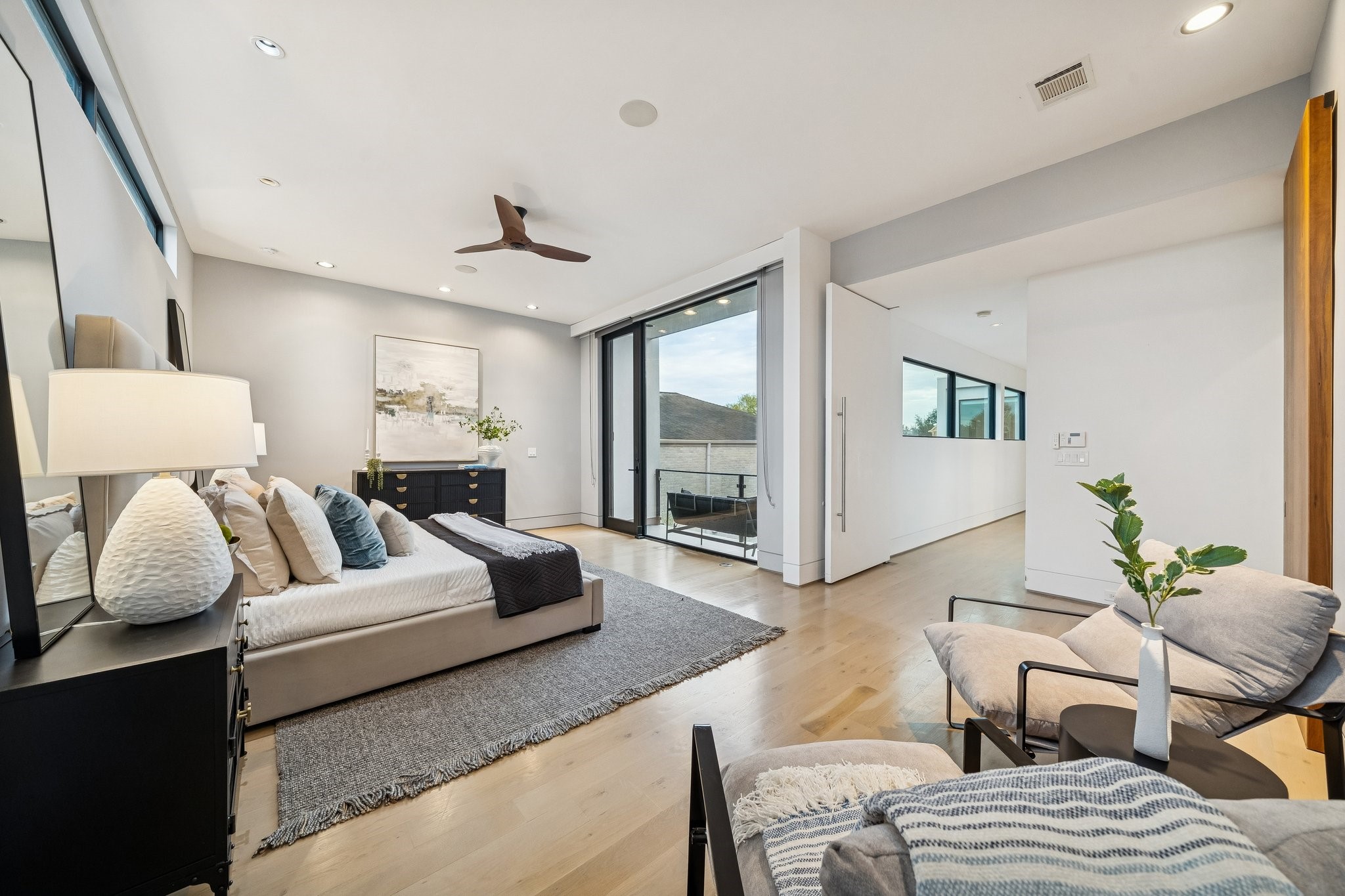 2332 Wroxton Road Houston, TX 77005 - Photo 27 of 50 a living room with furniture and wooden floor