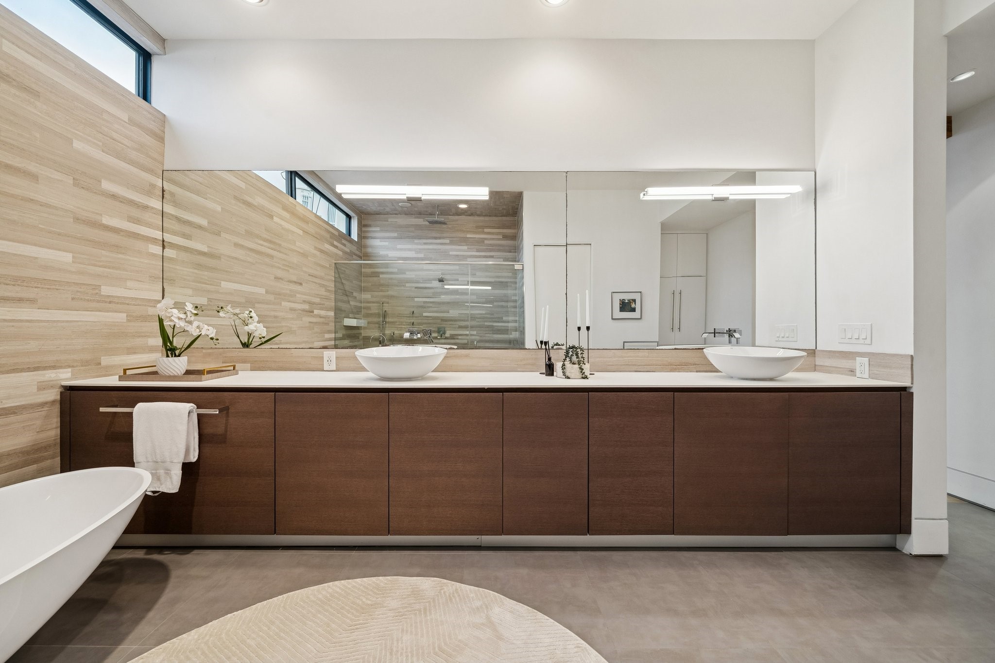 2332 Wroxton Road Houston, TX 77005 - Photo 32 of 50 a bathroom with a sink and a mirror