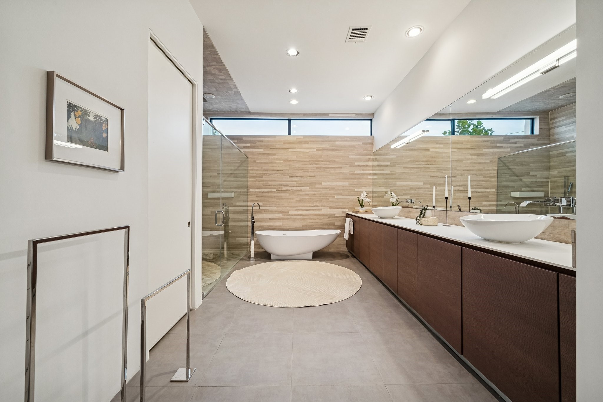2332 Wroxton Road Houston, TX 77005 - Photo 35 of 50 a bathroom with a double vanity sink toilet and a mirror