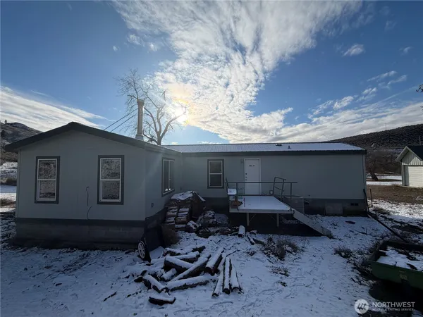 a car parked in front of a house