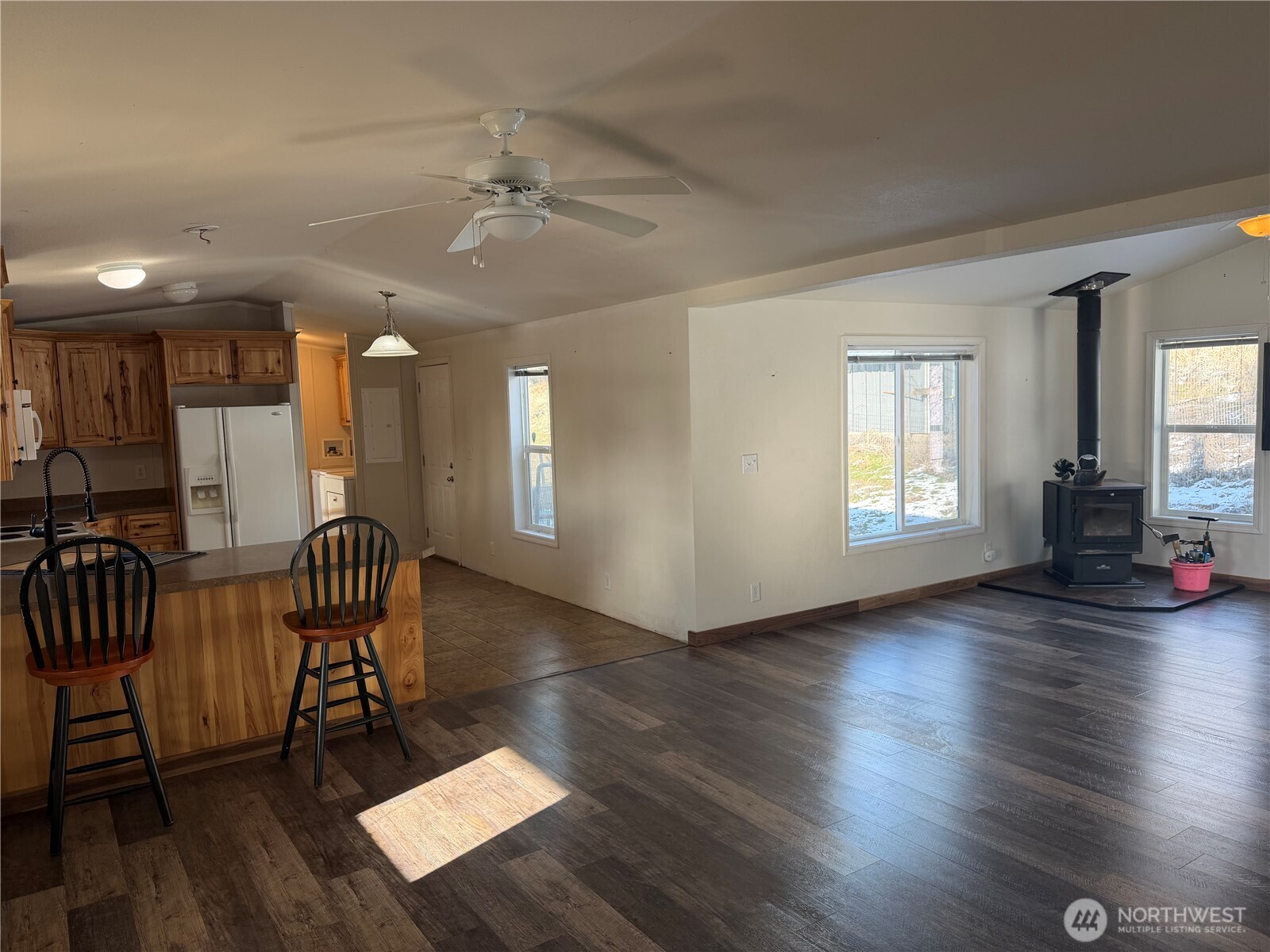 87 Canyon Creek Road Oroville, WA 98844 - Photo 14 of 24 a view of a livingroom with furniture and hardwood floor