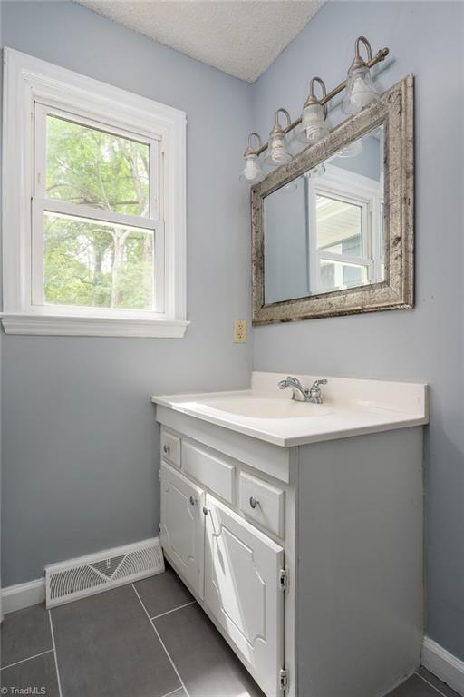 3606 Edgefield Road Greensboro, NC 27409 - Photo 14 of 41 primary bathroom