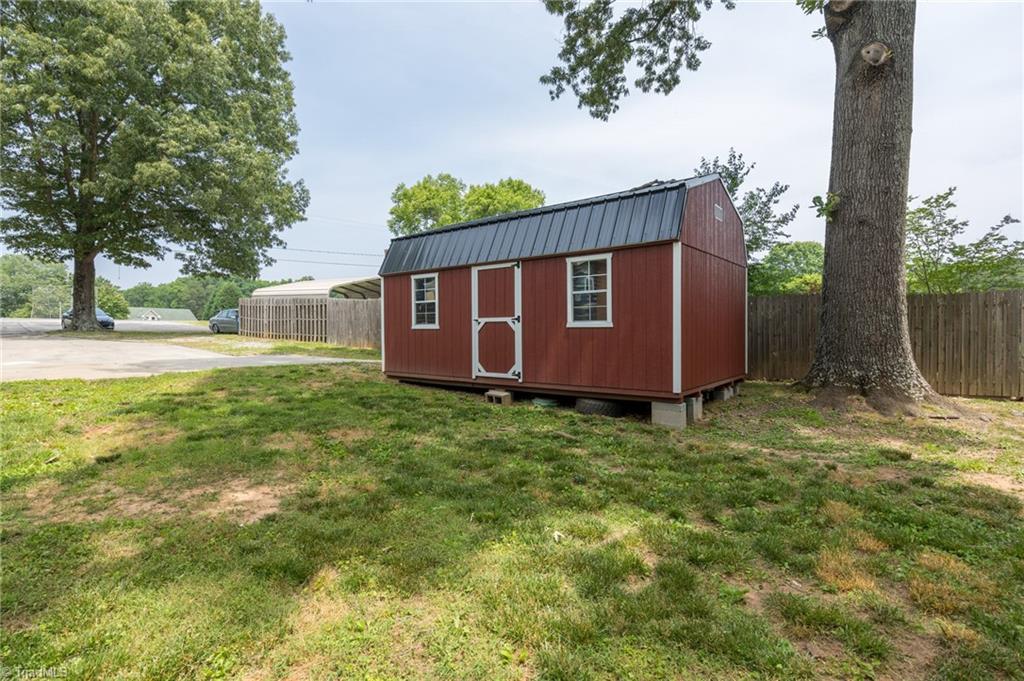 3606 Edgefield Road Greensboro, NC 27409 - Photo 34 of 41 wired storage building
