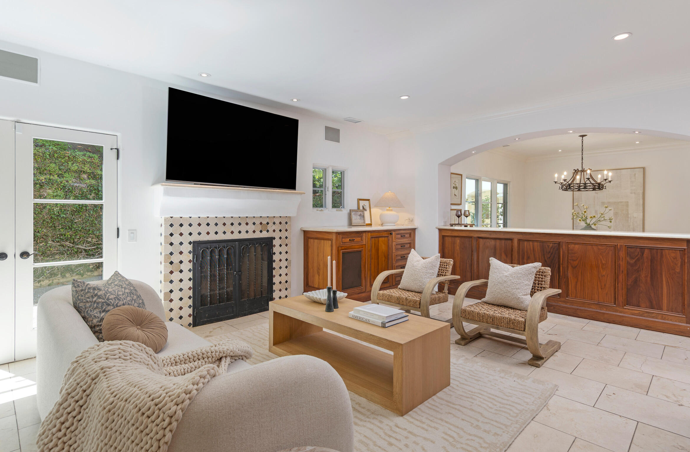 1493 Sycamore Canyon Road Montecito, CA 93108 - Photo 12 of 47 a living room with furniture fireplace and a flat screen tv