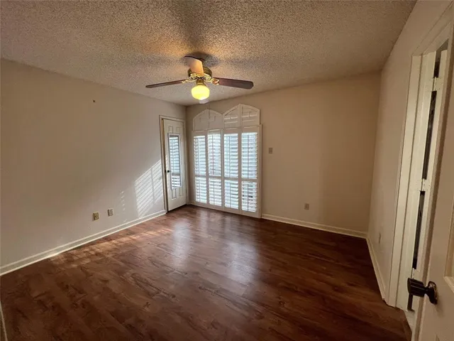 a bathroom with a toilet sink and shower