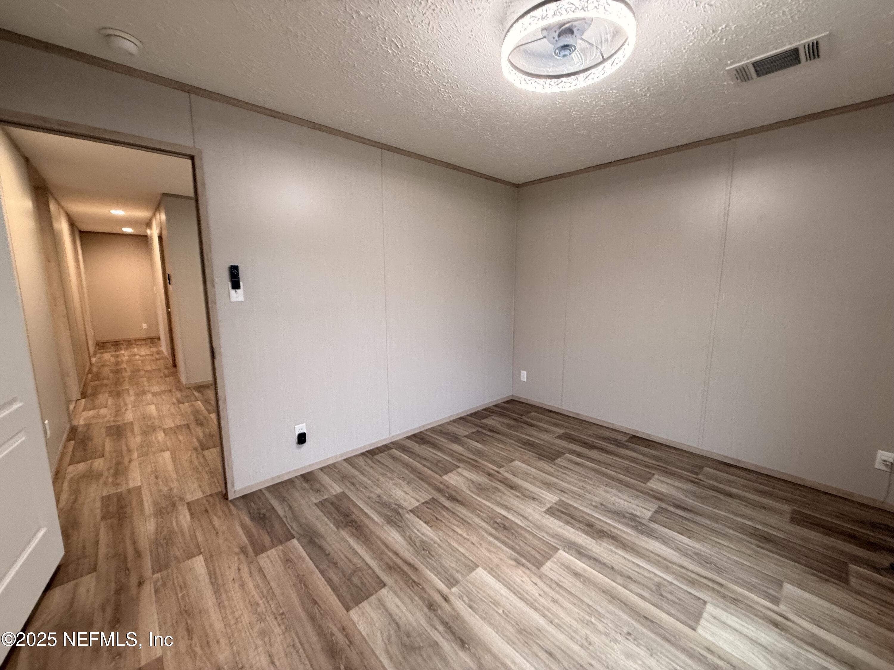 2355 Walters Road Middleburg, FL 32068 - Photo 24 of 63 a view of a livingroom with wooden floor