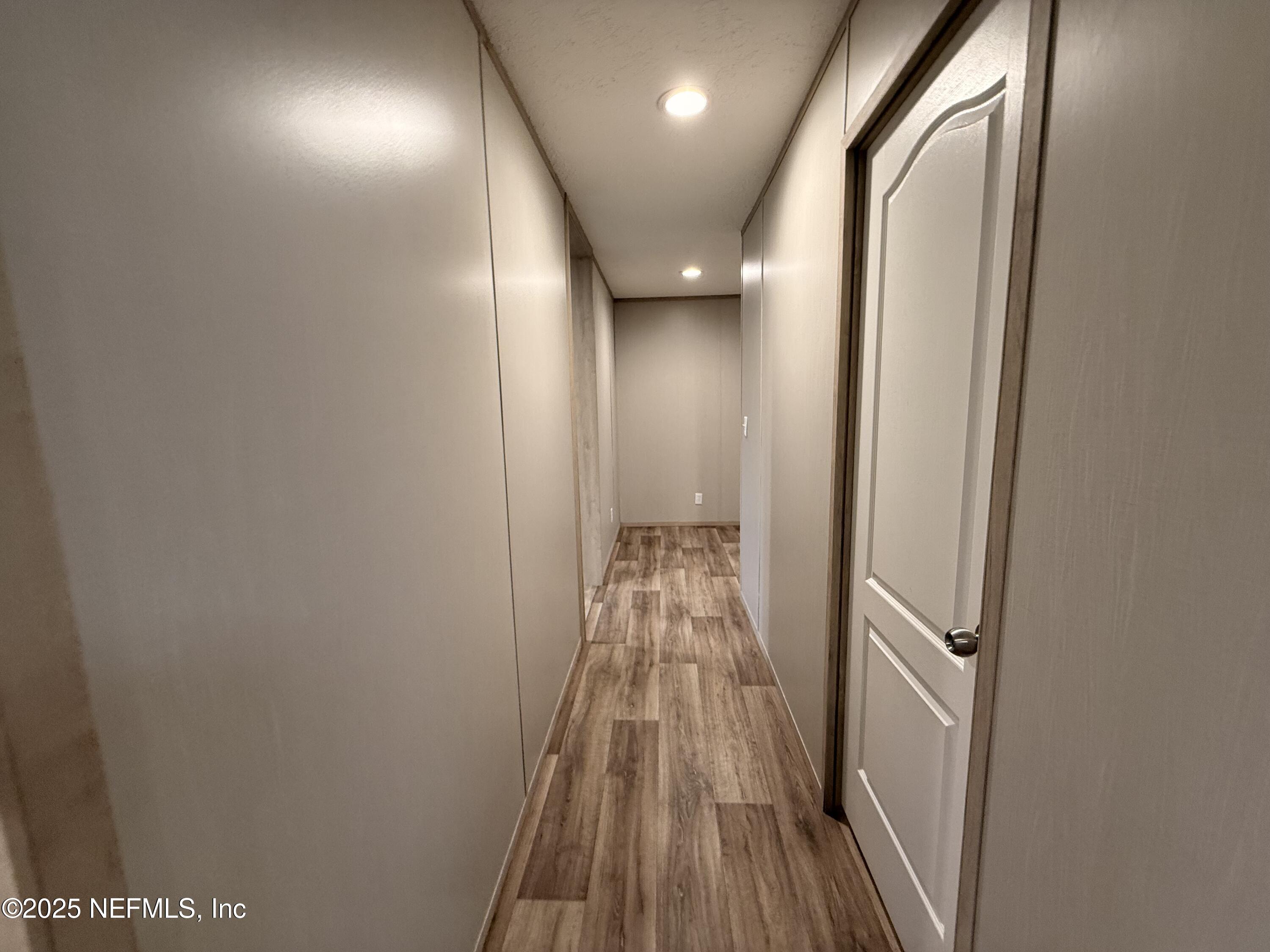 2355 Walters Road Middleburg, FL 32068 - Photo 27 of 63 a view of hallway with wooden floor