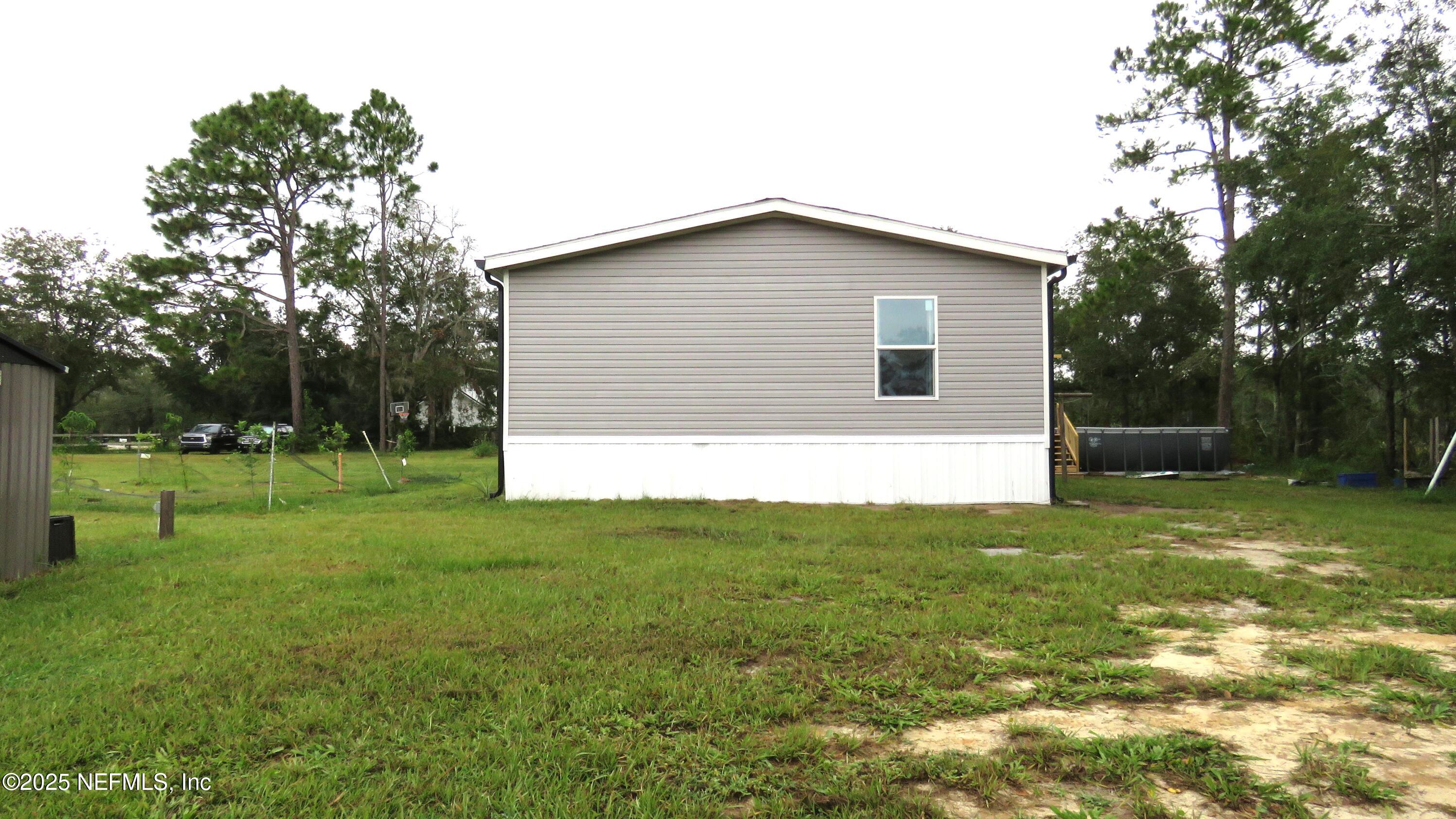 2355 Walters Road Middleburg, FL 32068 - Photo 32 of 63 a house view with a outdoor space