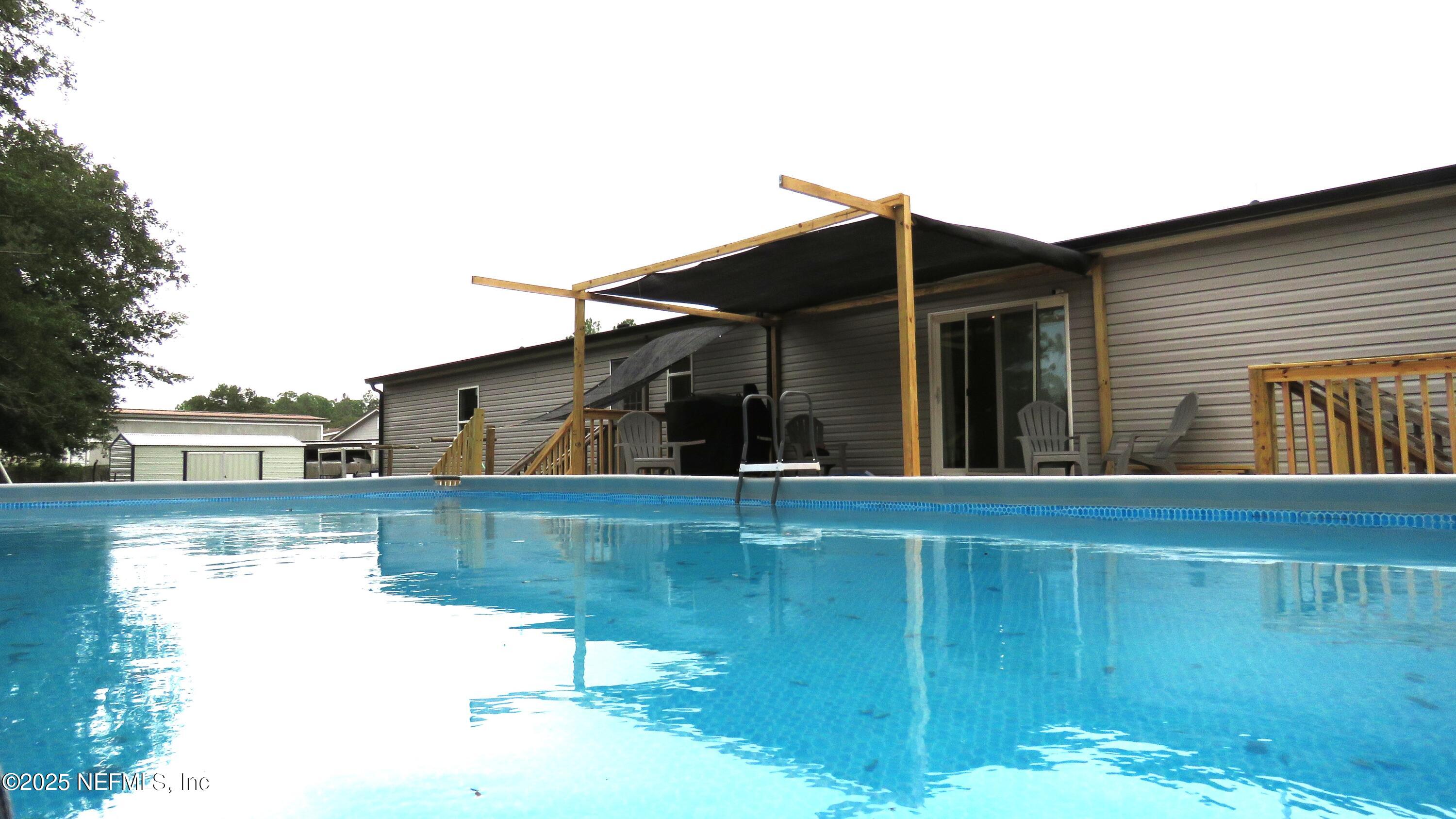 2355 Walters Road Middleburg, FL 32068 - Photo 38 of 63 a view of a house with a backyard