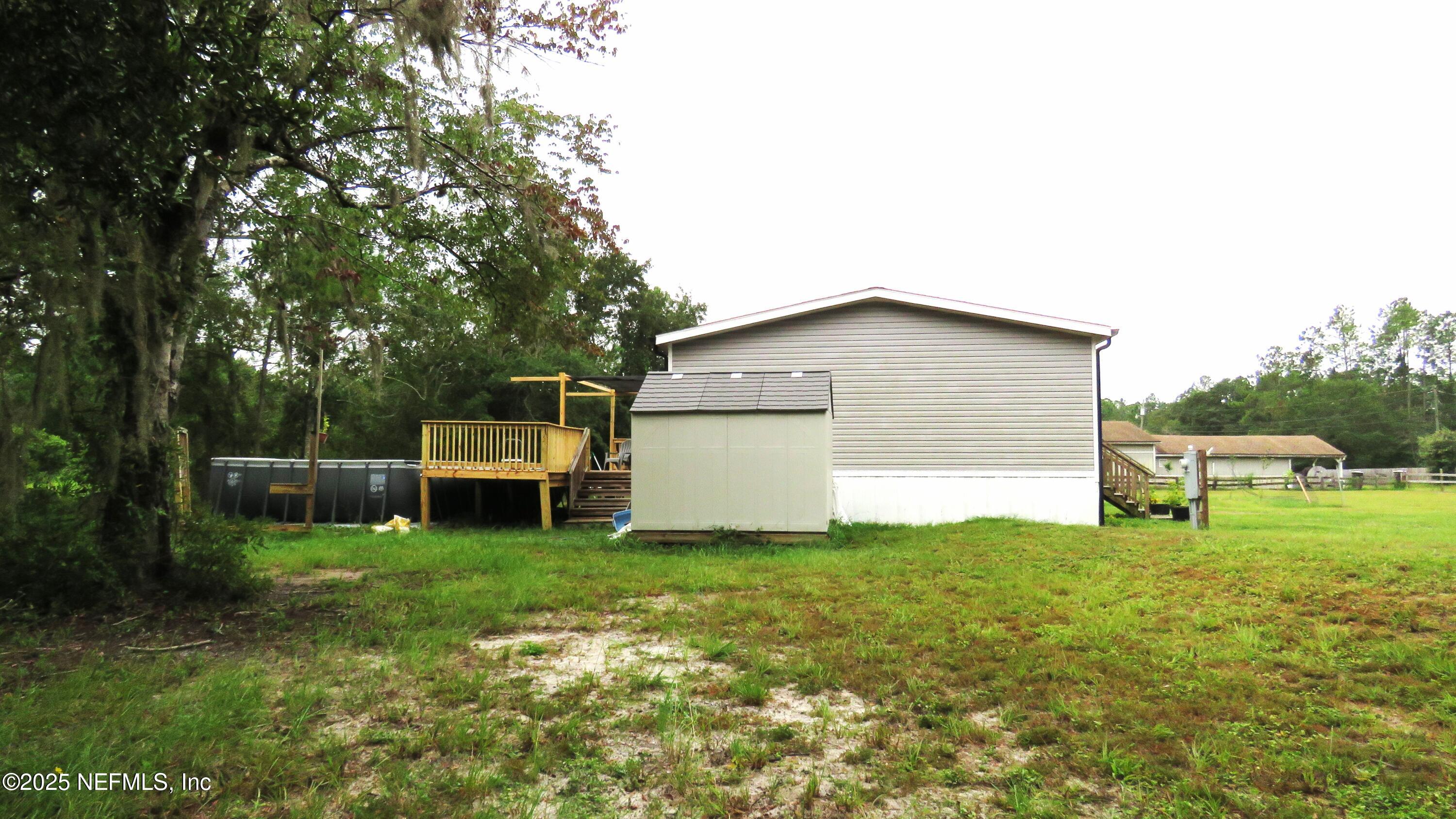 2355 Walters Road Middleburg, FL 32068 - Photo 42 of 63 a view of a house with a yard