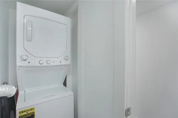 a bedroom with two beds and a window