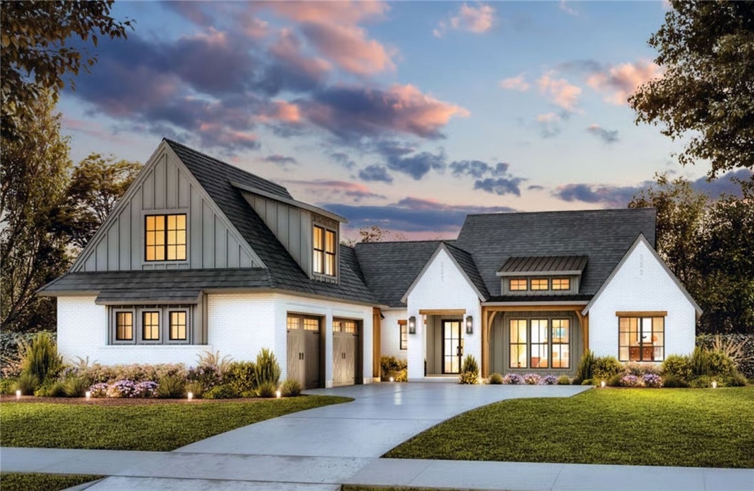 This photo is a stock photo from the house plan website. The actual home is on a crawlspace. It will be white brick and have a black architectural roof and the look will be very close to this image.