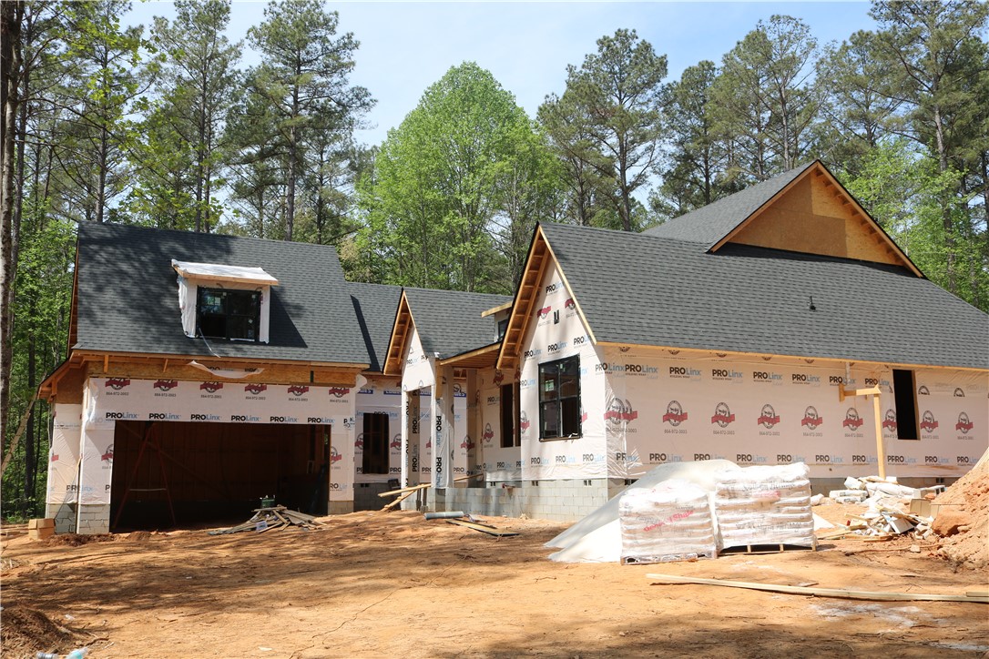 220 Mill Pine Road Liberty, SC 29657 - Photo 2 of 11 This is a front image, taken 4/18/2026. This new construction home features a classic roofline and an attached garage.