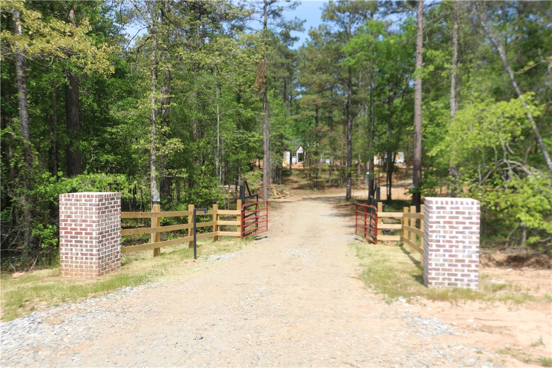 220 Mill Pine Road Liberty, SC 29657 - Photo 6 of 11 This is the entrance looking form the road toward the home. Driveway will be asphalted.