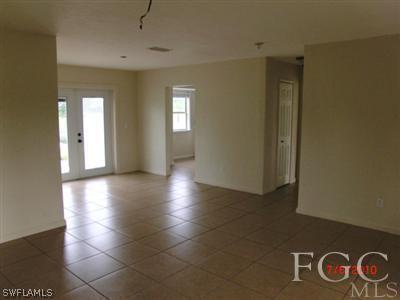 11750 Shawnee Road Fort Myers, FL 33913 - Photo 4 of 10 a view of an empty room with a window