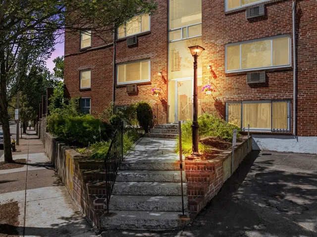 a view of a house with sitting area