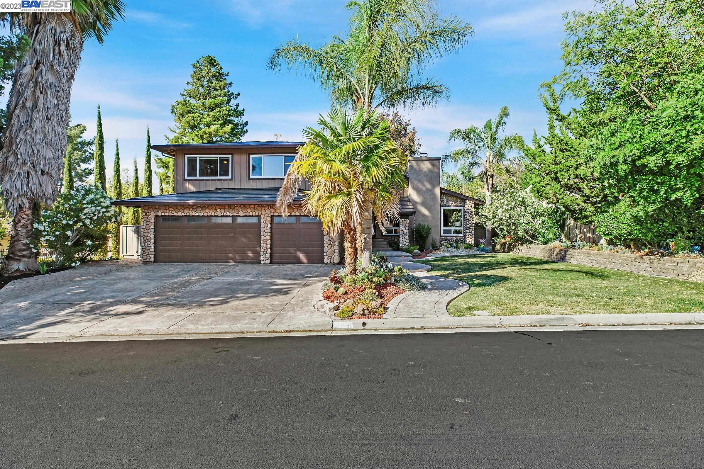a view of a house with a street