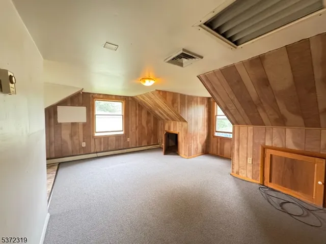 a view of empty room with windows