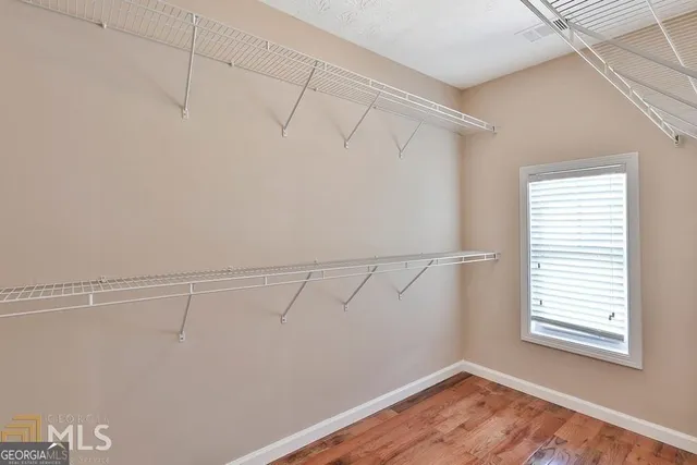 a view of a room with racks on the wall