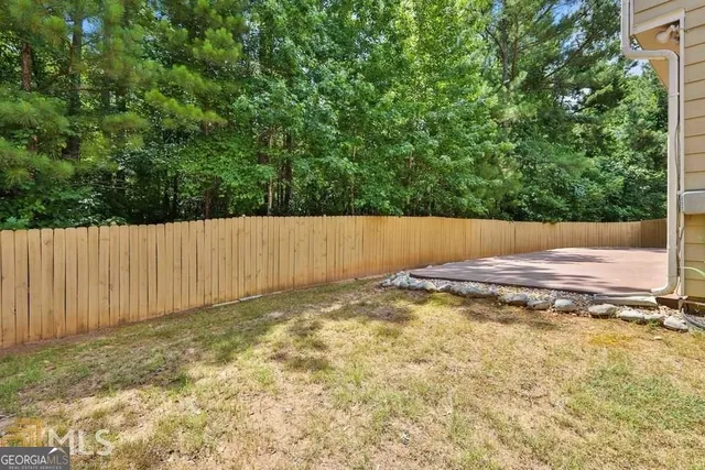 a view of a park with a tree