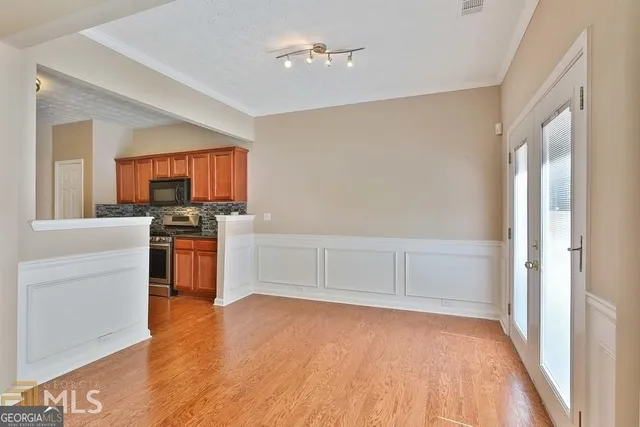 a view of a kitchen with microwave and stove