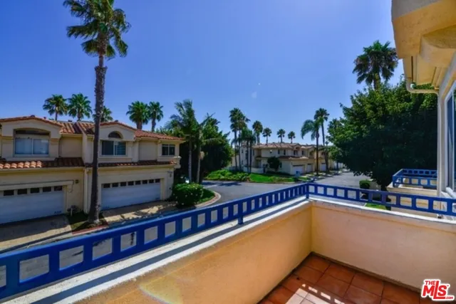 a view of swimming pool with a patio
