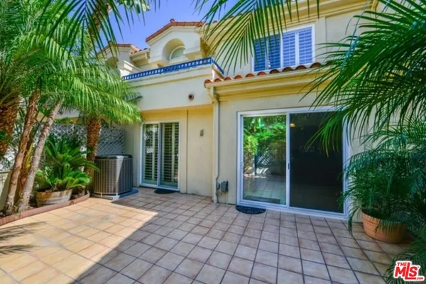 a view of a house with a patio