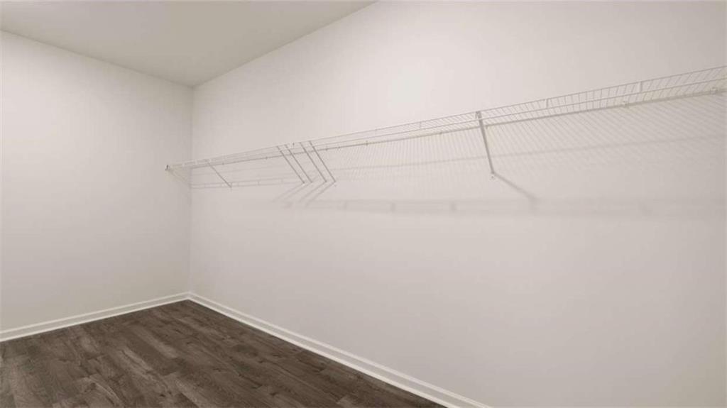 1812 Quaker Street Hampton, GA 30228 - Photo 29 of 53 a view of a room with racks on the wall