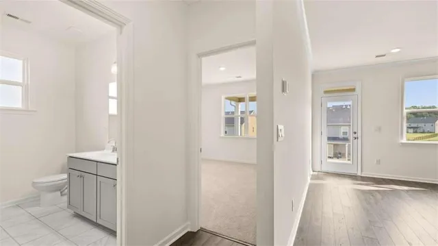 a view of an empty room with a window