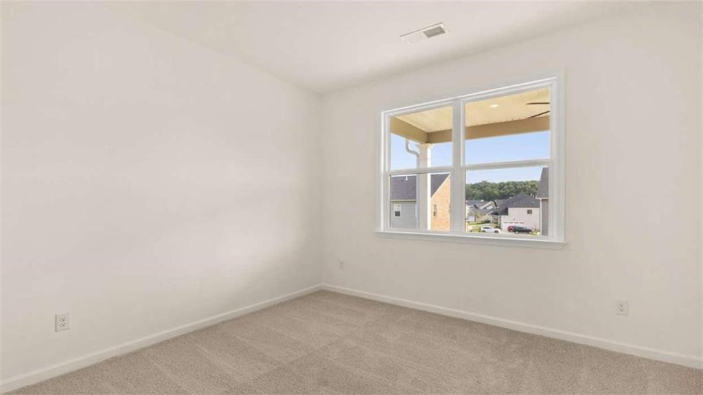 1812 Quaker Street Hampton, GA 30228 - Photo 35 of 53 an empty room with a window