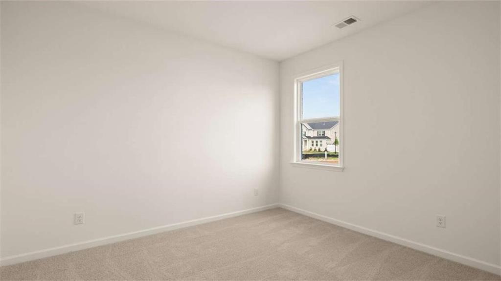 1812 Quaker Street Hampton, GA 30228 - Photo 37 of 53 a view of an empty room with a window