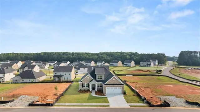 a view of a swimming pool with a lake view