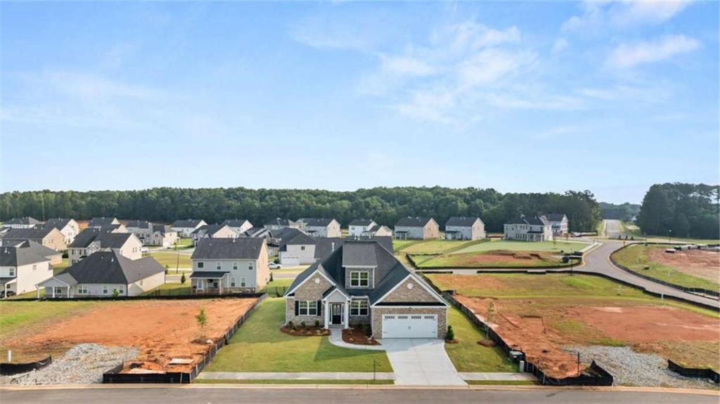 1812 Quaker Street Hampton, GA 30228 - Photo 4 of 53 a view of a swimming pool with a lake view
