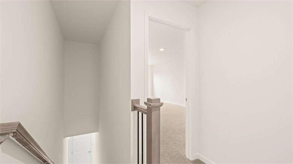 1812 Quaker Street Hampton, GA 30228 - Photo 42 of 53 a view of a hallway with wooden floor