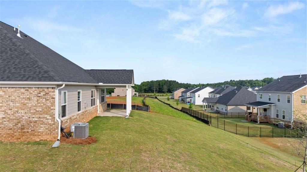 1812 Quaker Street Hampton, GA 30228 - Photo 48 of 53 a house view with a garden space