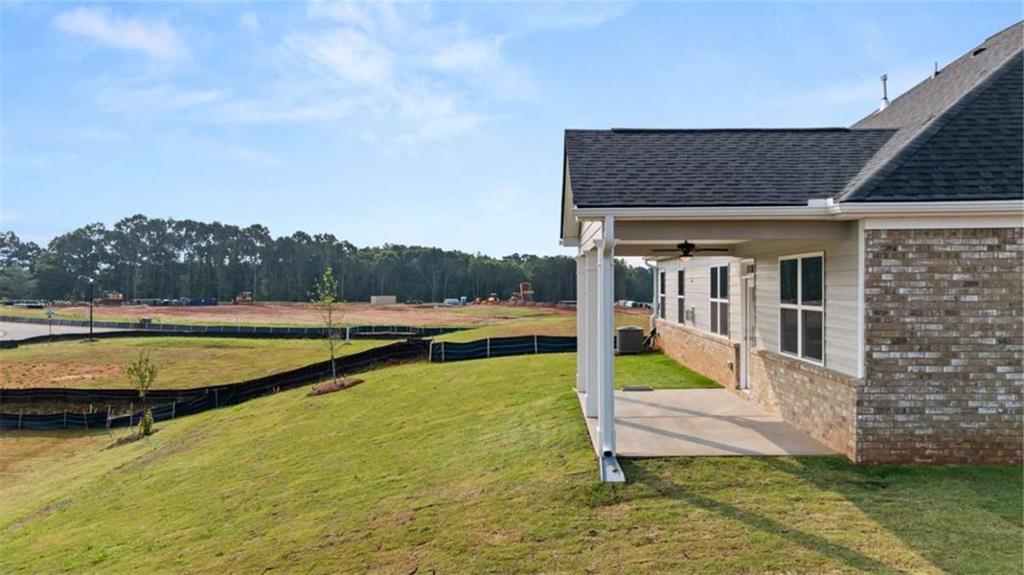 1812 Quaker Street Hampton, GA 30228 - Photo 49 of 53 a view of a house with swimming pool and sitting area