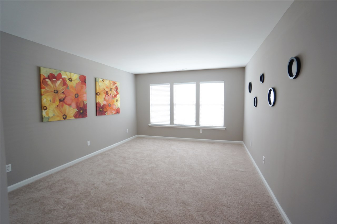 7730 San Gabriel Street Raleigh, NC 27613 - Photo 17 of 25 Bright & spacious bedrooms provide ample space & versatility for your ever changing & growing needs. Bedroom