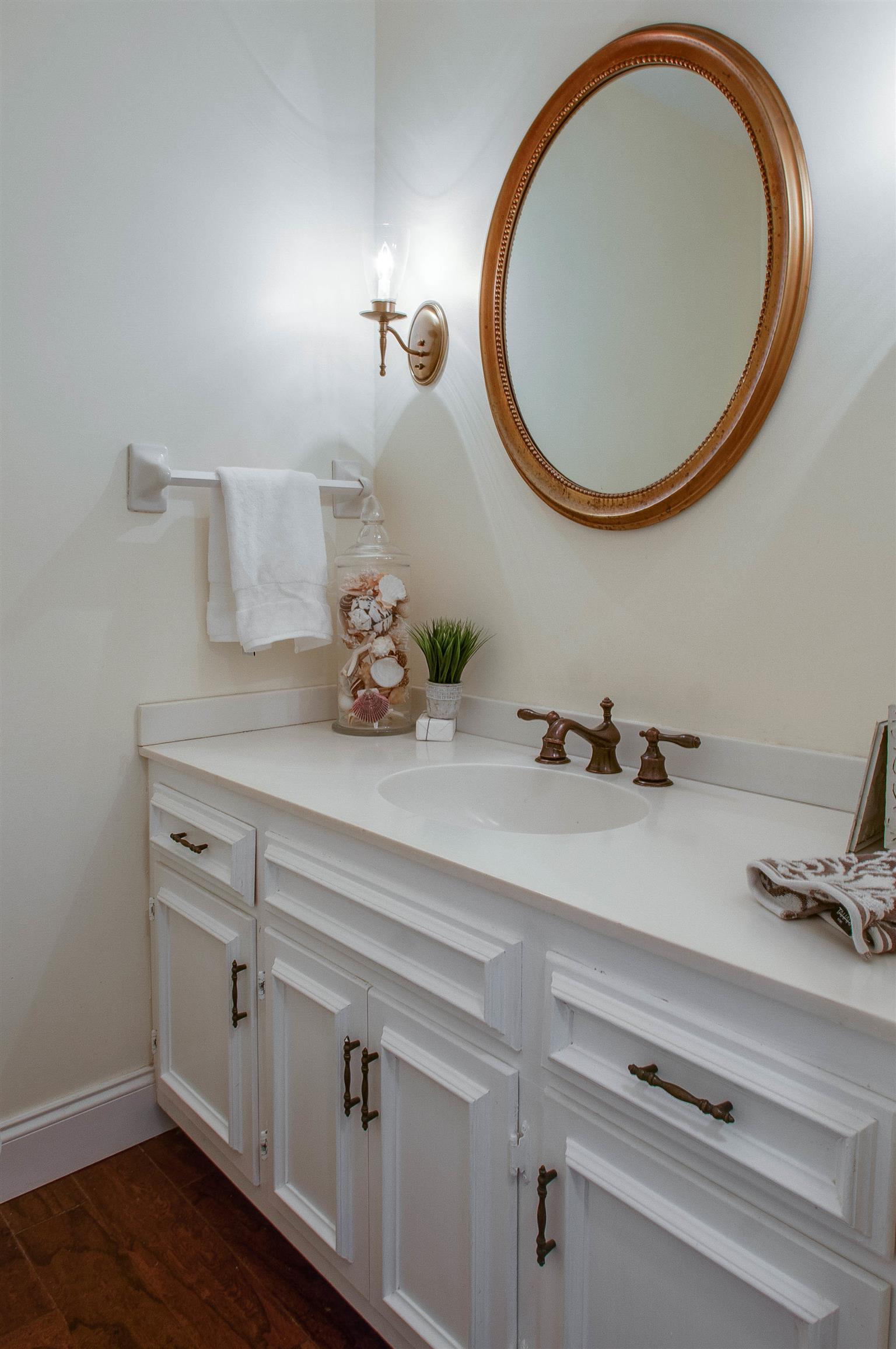 850 General George Patton Road, Unit 850 Nashville, TN 37221 - Photo 14 of 25 a bathroom with a sink and a mirror