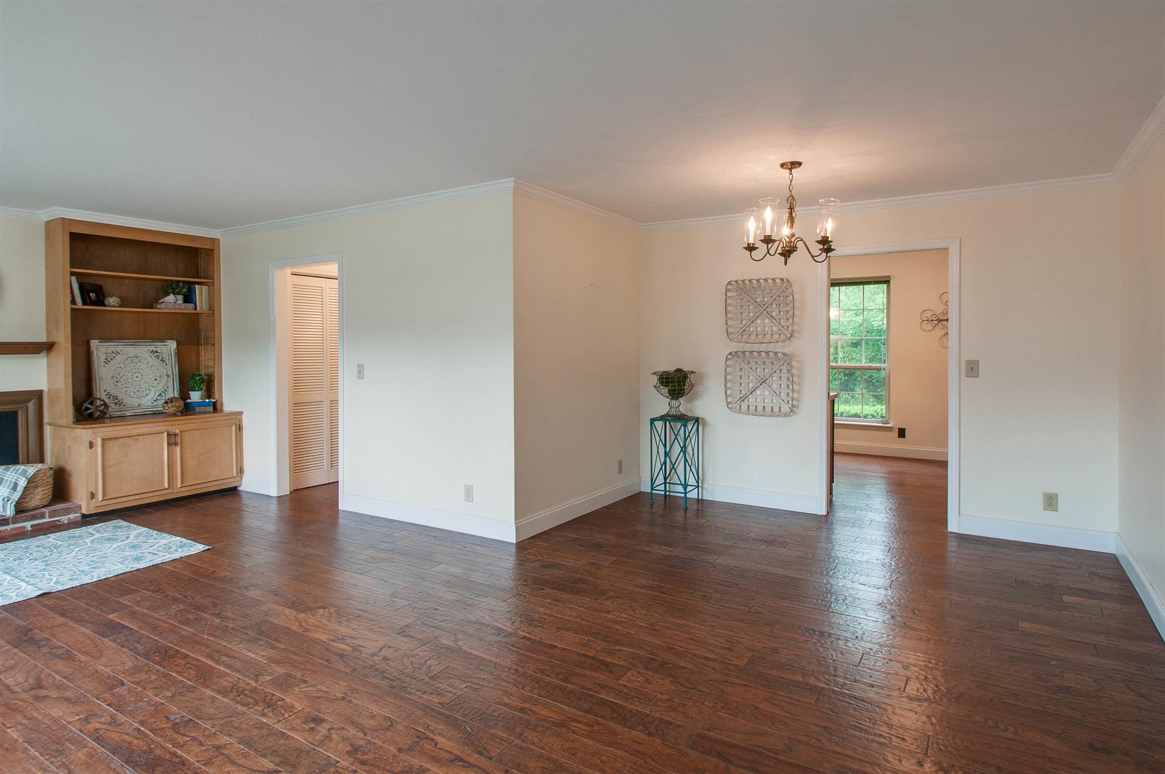 850 General George Patton Road, Unit 850 Nashville, TN 37221 - Photo 6 of 25 wooden floor in an empty room with a window