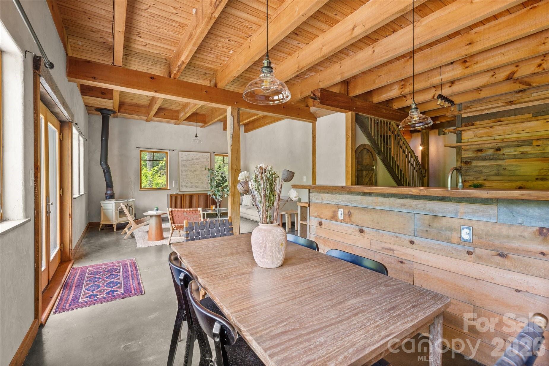 3151 Lumptown Road Marshall, NC 28753 - Photo 20 of 48 a outdoor dining area with a table and chairs