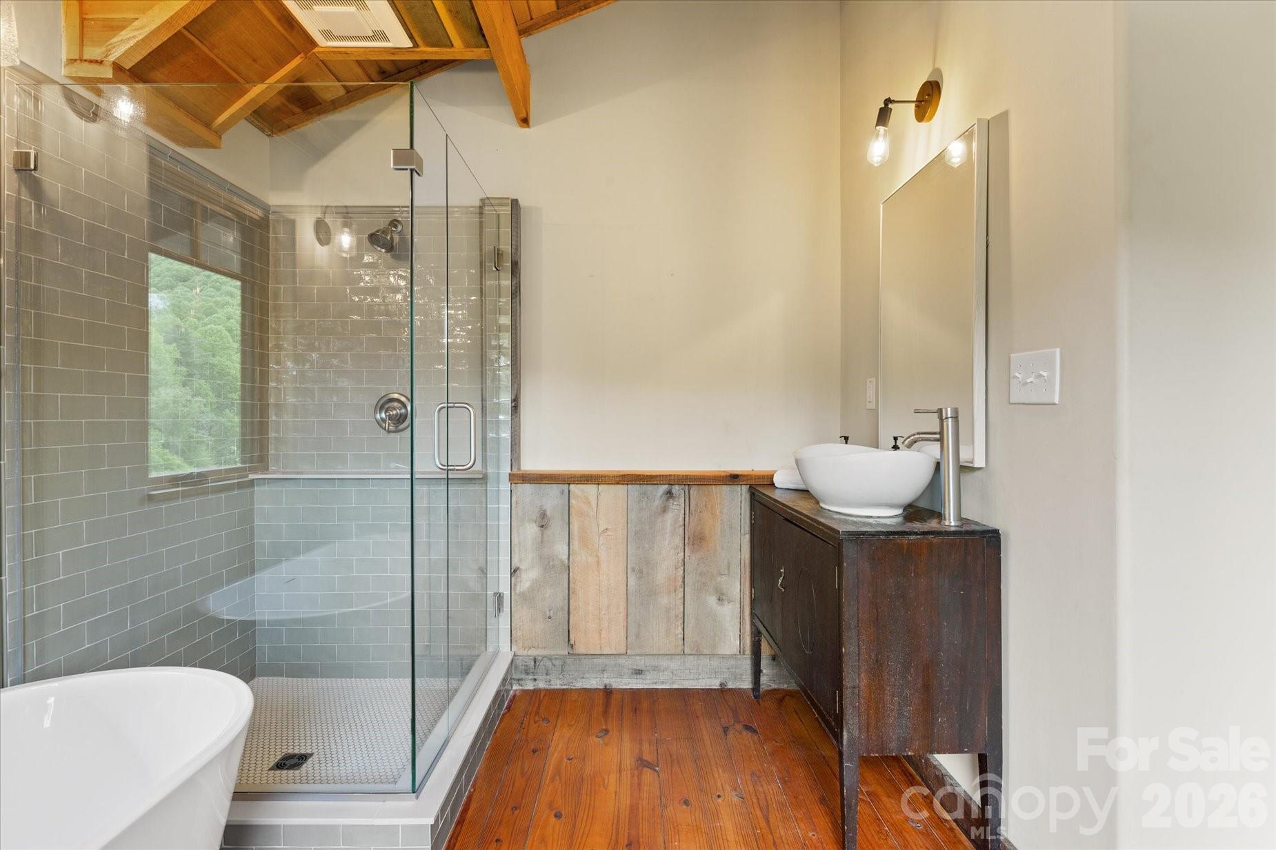 3151 Lumptown Road Marshall, NC 28753 - Photo 29 of 48 a bathroom with a sink a toilet and shower