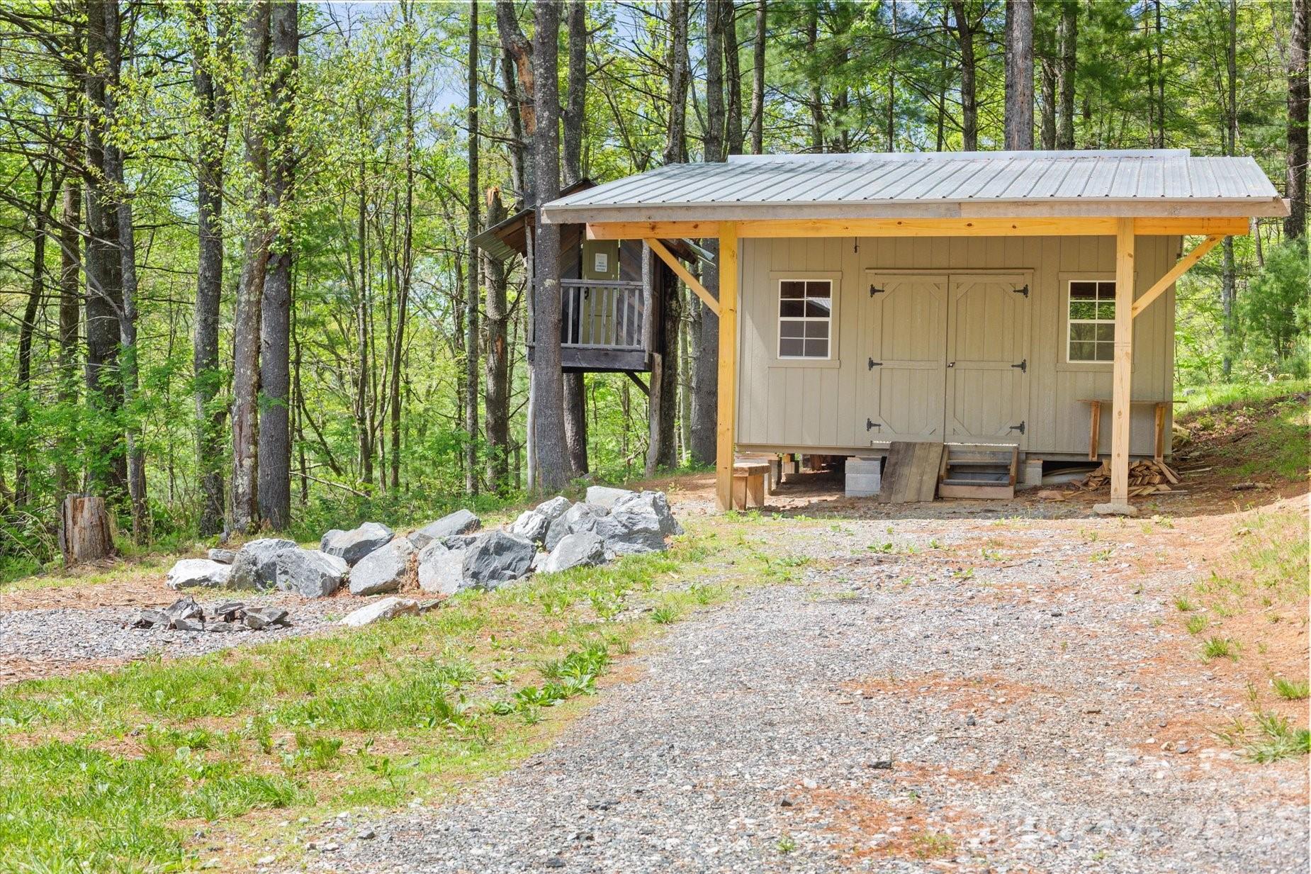 3151 Lumptown Road Marshall, NC 28753 - Photo 39 of 48 a front view of a house with a yard