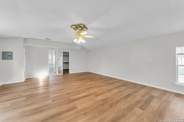 a view of an empty walk in closet