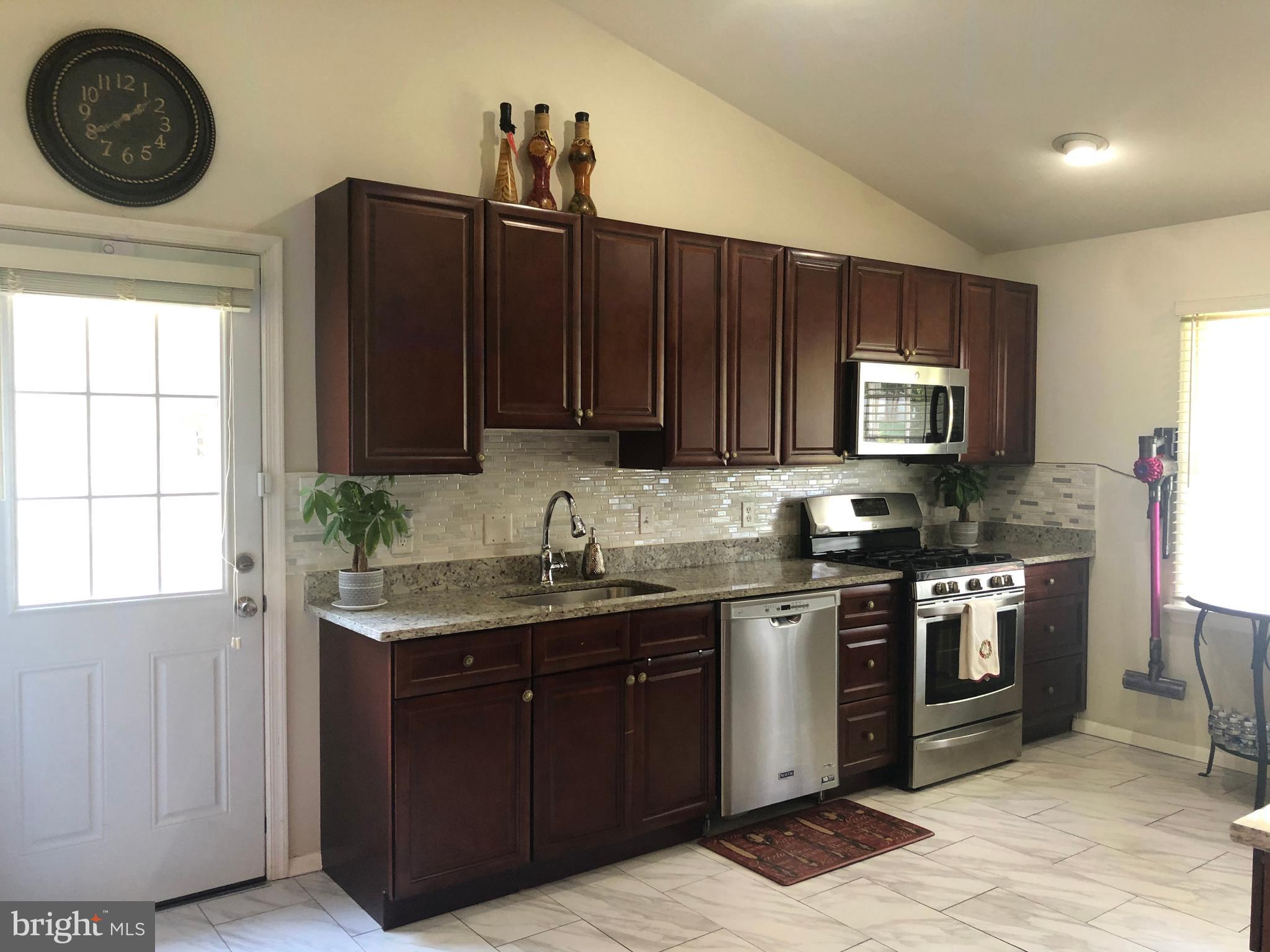 9504 Braddock Road Fairfax, VA 22032 - Photo 16 of 49 Kitchen w/ Good Cabinet & Stainless Steel appl