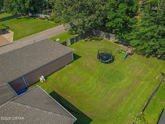 a view of an outdoor space and a yard