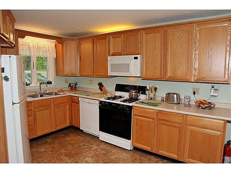 24 Old Cluff Road Kennebunkport, ME 04046 - Photo 17 of 35 Kitchen. Oak cabinets to match the...