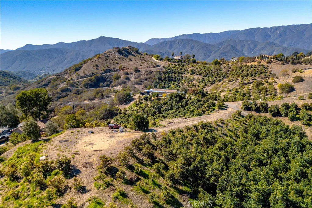 39238 Daily Fallbrook, CA 92028 - Photo 5 of 16 a view of a lush green hillside and houses