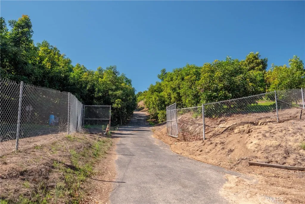 39238 Daily Fallbrook, CA 92028 - Photo 8 of 16 a backyard of a house with table and chairs