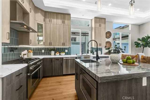 a kitchen with a stove and a sink